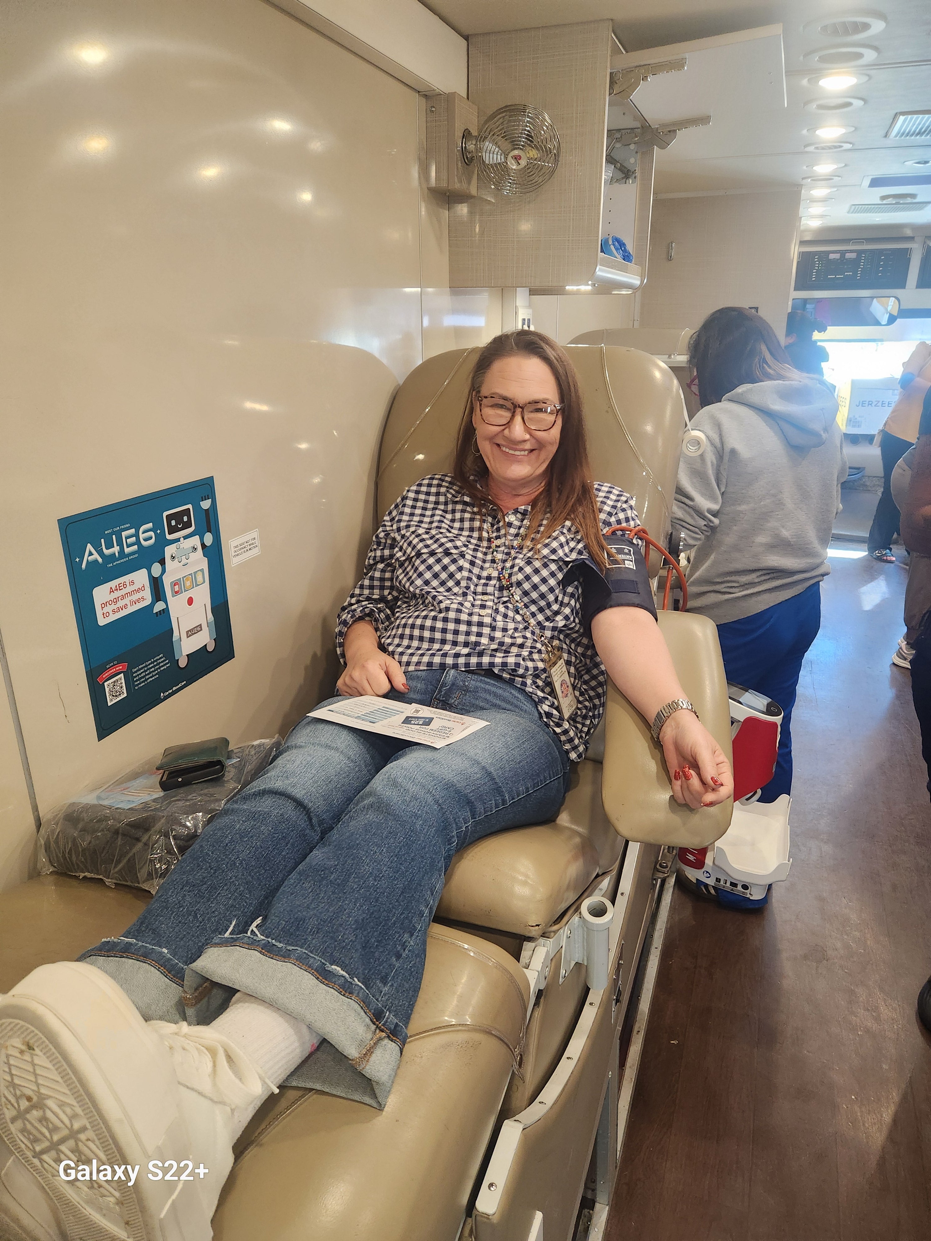 Photo of TCEC employee giving blood donation