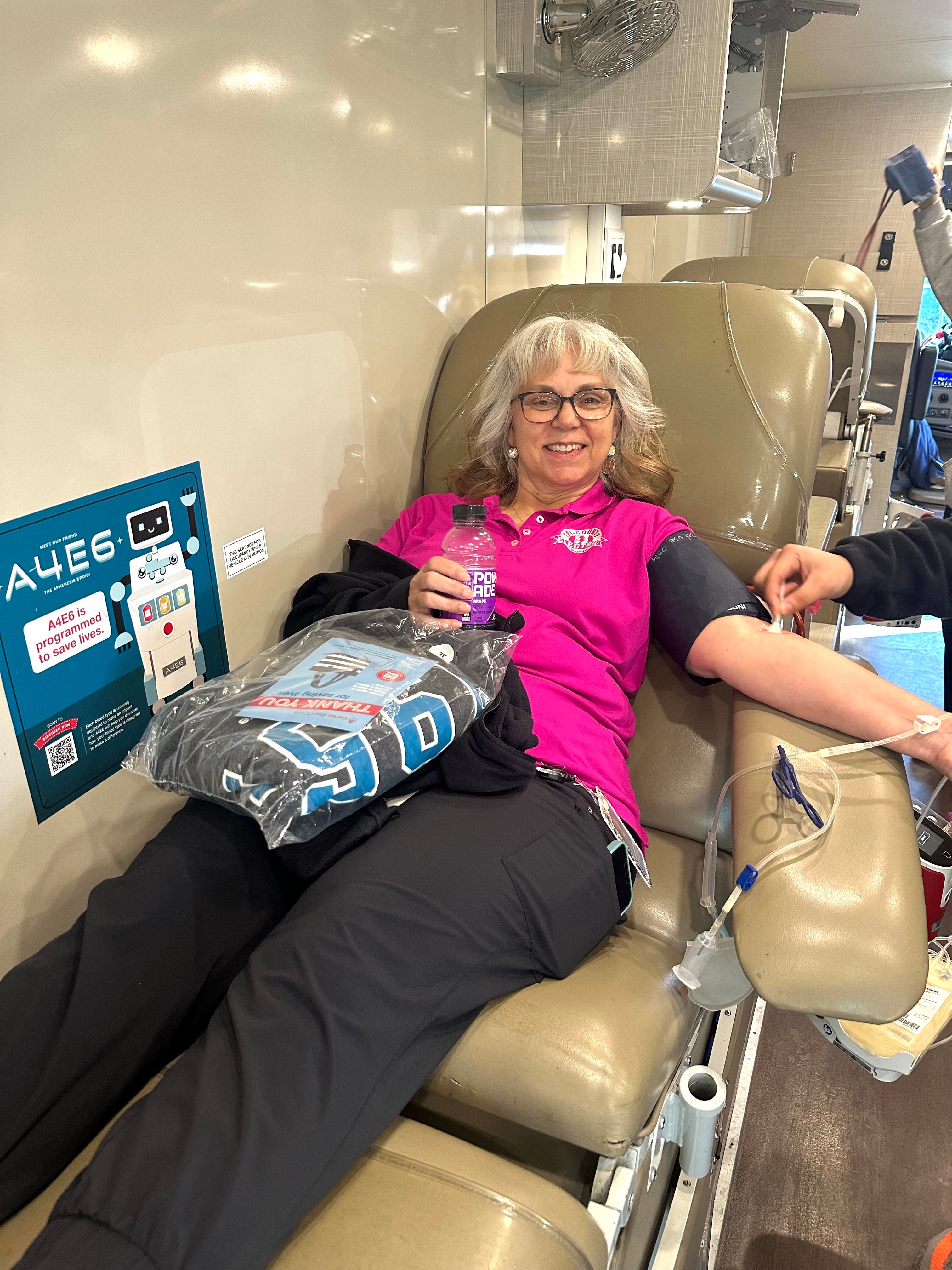Photo of TCEC employee giving blood donation