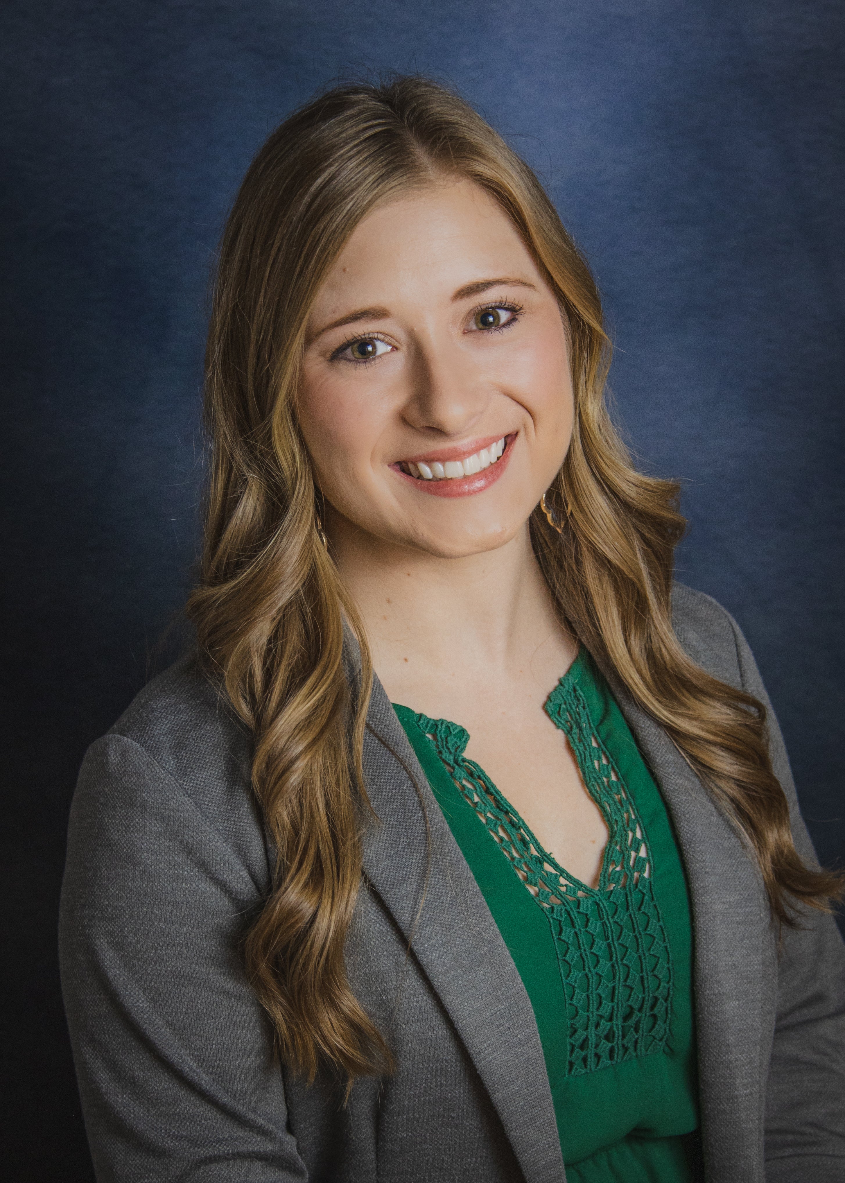 Headshot photo of Kelsey Gustainis