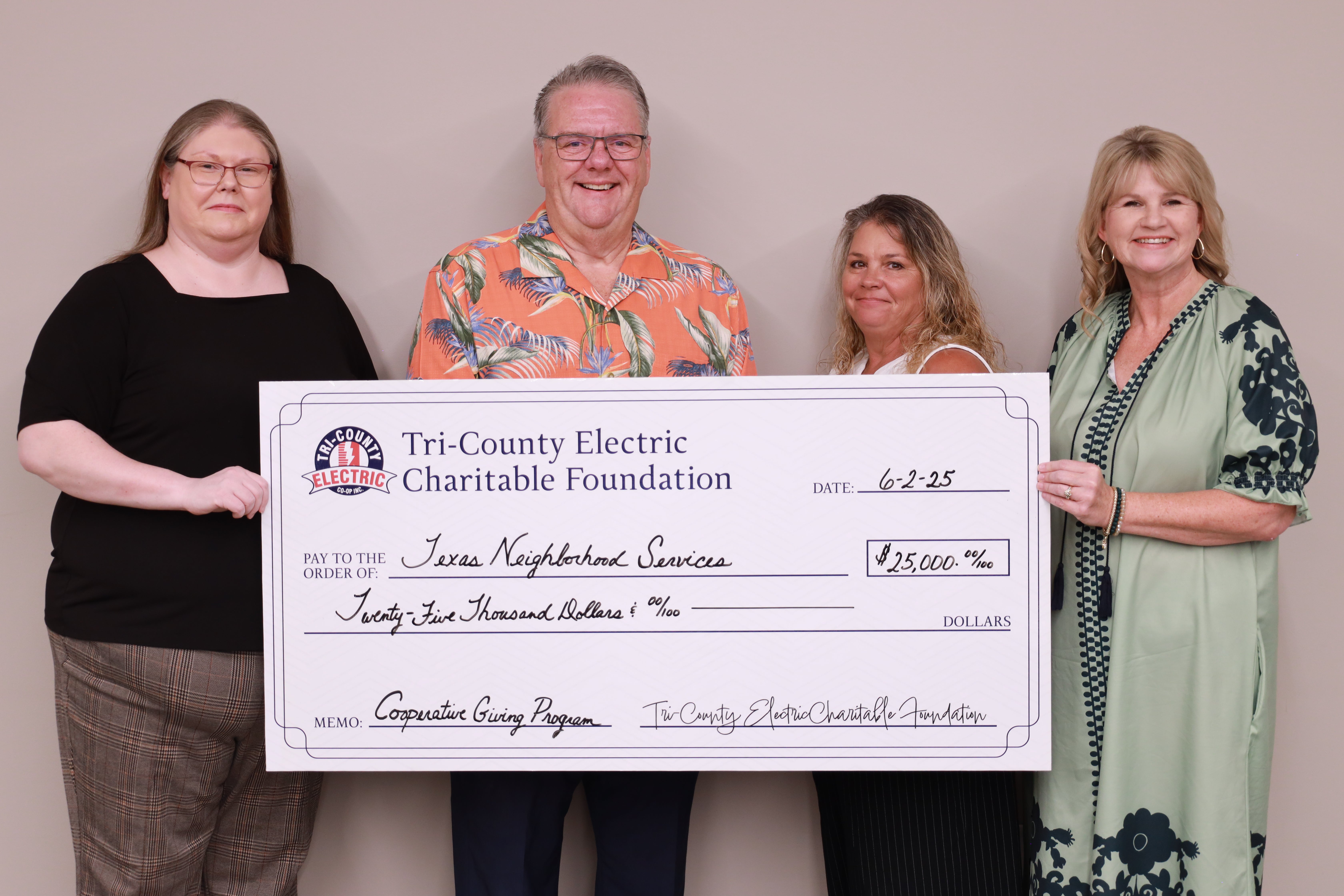 TCEC and Texas Neighborbood Services pose for photo