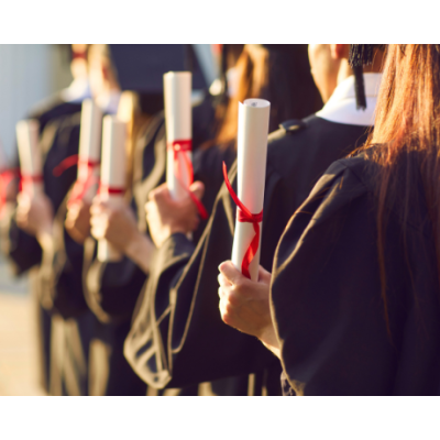 photo of students holding diplomas