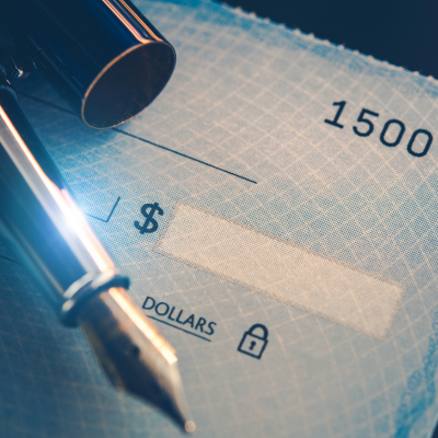 image of financial check with a pen